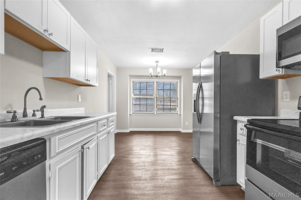 6125 GRETA Place